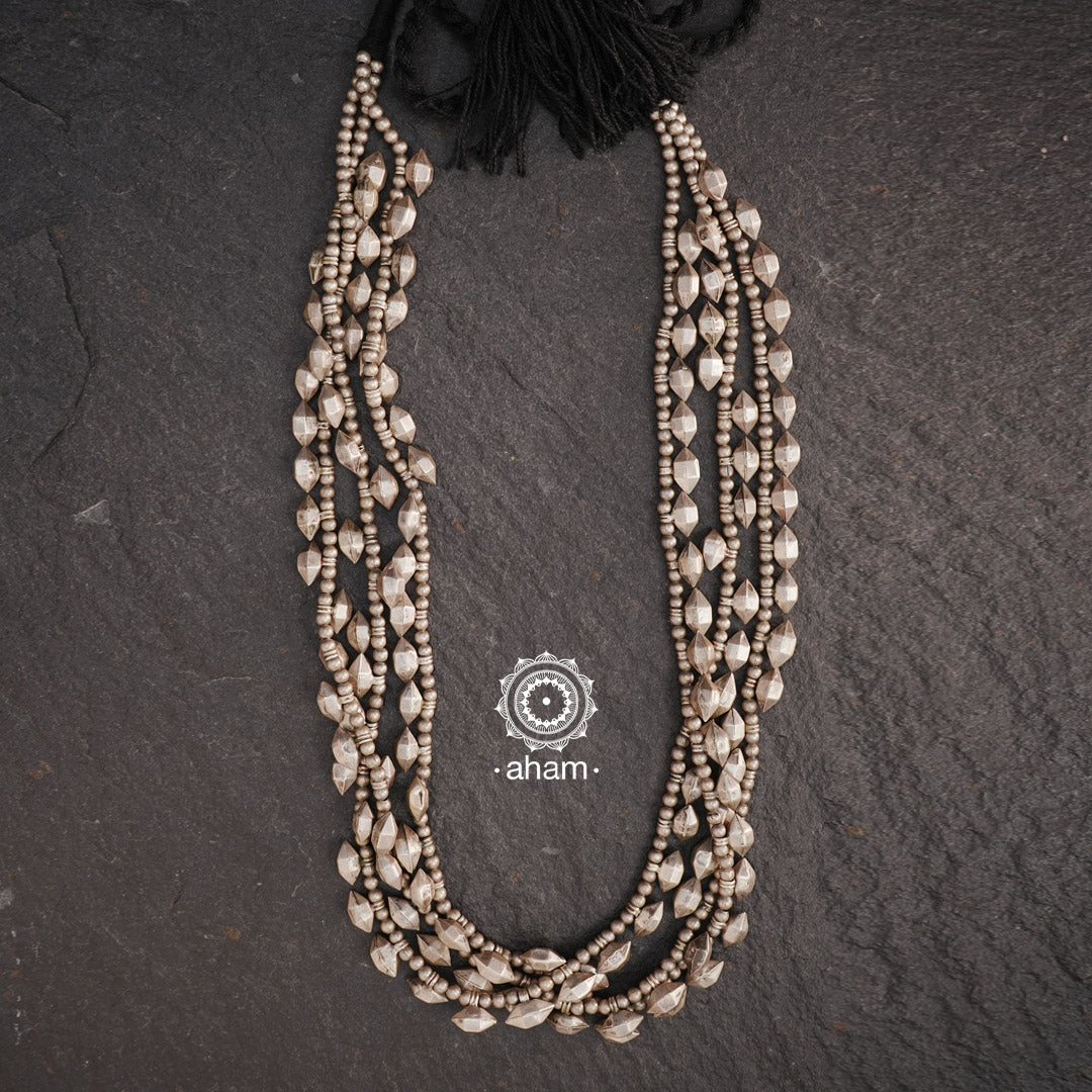 Add a touch of elegance to any outfit with our Multi Line Tribal Silver Neckpiece. Featuring beautiful beads in a 3 line layered style, this versatile necklace is the perfect addition to your jewellery collection. Elevate any look with this unique and stylish accessory.