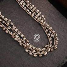 Add a touch of elegance to any outfit with our Multi Line Tribal Silver Neckpiece. Featuring beautiful beads in a 3 line layered style, this versatile necklace is the perfect addition to your jewellery collection. Elevate any look with this unique and stylish accessory.