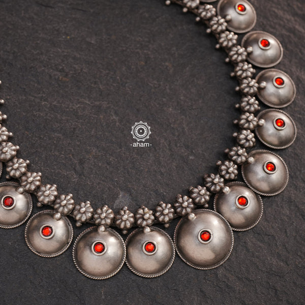 This silver neckpiece is a classic design that will never go out of style. It is meticulously handmade in Rajasthan, showcasing the skill and expertise of the region.