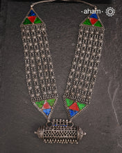 Tribal Silver Rani Har. Typical to Jaisalmer and Barmer area of Rajasthan India
These beautiful vintage pieces carry a slice of history with them. 
They are made by skilled artisans and involve various hand technique such as soldering, hammering, casting, stamping, dapping and glass setting.