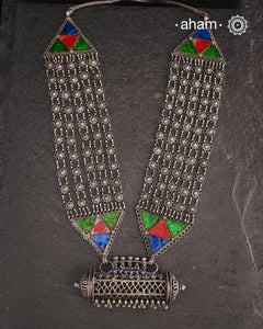 Tribal Silver Rani Har. Typical to Jaisalmer and Barmer area of Rajasthan India
These beautiful vintage pieces carry a slice of history with them. 
They are made by skilled artisans and involve various hand technique such as soldering, hammering, casting, stamping, dapping and glass setting.