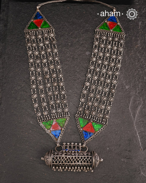 Tribal Silver Rani Har. Typical to Jaisalmer and Barmer area of Rajasthan India
These beautiful vintage pieces carry a slice of history with them. 
They are made by skilled artisans and involve various hand technique such as soldering, hammering, casting, stamping, dapping and glass setting.