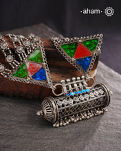 Tribal Silver Rani Har. Typical to Jaisalmer and Barmer area of Rajasthan India
These beautiful vintage pieces carry a slice of history with them. 
They are made by skilled artisans and involve various hand technique such as soldering, hammering, casting, stamping, dapping and glass setting.