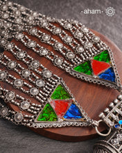 Tribal Silver Rani Har. Typical to Jaisalmer and Barmer area of Rajasthan India
These beautiful vintage pieces carry a slice of history with them. 
They are made by skilled artisans and involve various hand technique such as soldering, hammering, casting, stamping, dapping and glass setting.