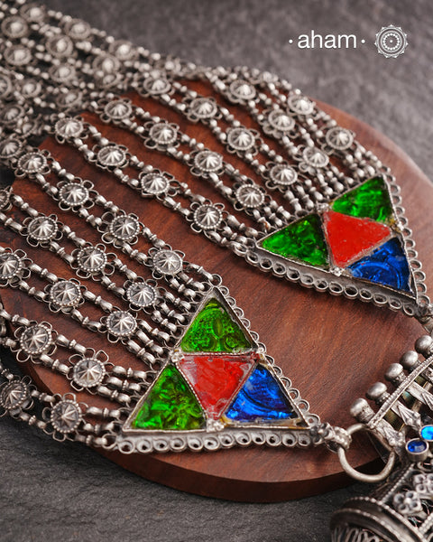 Tribal Silver Rani Har. Typical to Jaisalmer and Barmer area of Rajasthan India
These beautiful vintage pieces carry a slice of history with them. 
They are made by skilled artisans and involve various hand technique such as soldering, hammering, casting, stamping, dapping and glass setting.