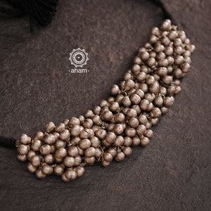 Experience the versatility and cultural charm with our Tribal Ghungroo Silver Choker. Adorned with multiple ghungroos, it can be styled as a choker, arm band, as gajra in your hair or as a bracelet, allowing you to get creative with your look this Navratri. Made of silver, this piece will add an elegant touch to any outfit.