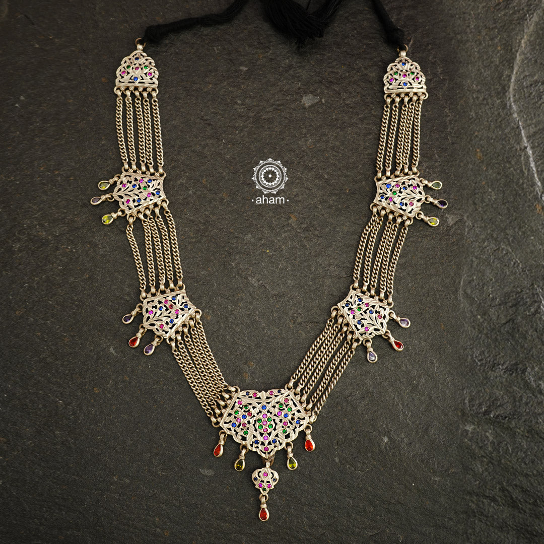 Experience the cultural elegance with our Vintage Tribal Silver Neckpiece. Adorned with intricate chilai work, it boasts a stunning vintage design. Made for those who appreciate traditional craftsmanship, this neckpiece adds a touch of sophisticated charm to any outfit. Embrace the heritage and elevate your style.