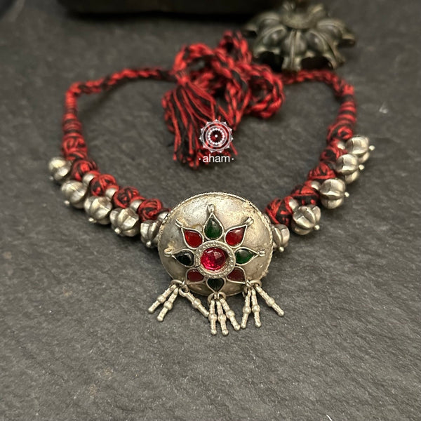 Tribal Borla Silver Neckpiece with adjustable thread.
The Rajasthani Borla - Mangtika along with beautiful trinket silver beads has been given a new twist by threading them into a beautiful unique short neckpiece. A perfect, unique piece to wear with your ethnic wear.