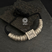 Handcrafted tribal silver Hasli with adjustable cotton thread.
Crafted by skilled artisans from Kutch