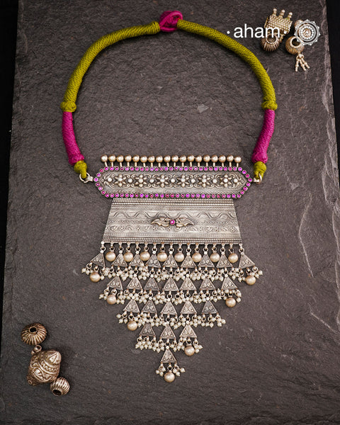 Experience the rich heritage of Rajasthan with this exquisite Aad silver neckpiece. Meticulously handcrafted in silver, it showcases traditional craftsmanship that reflects the region's cultural legacy. This neckpiece is more than jewellery—it's a timeless statement of artistry and tradition, perfect for those who appreciate authentic heritage in every detail.