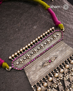 Experience the rich heritage of Rajasthan with this exquisite Aad silver neckpiece. Meticulously handcrafted in silver, it showcases traditional craftsmanship that reflects the region's cultural legacy. This neckpiece is more than jewellery—it's a timeless statement of artistry and tradition, perfect for those who appreciate authentic heritage in every detail.