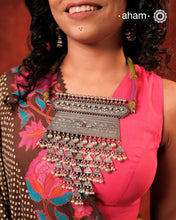 Experience the rich heritage of Rajasthan with this exquisite Aad silver neckpiece. Meticulously handcrafted in silver, it showcases traditional craftsmanship that reflects the region's cultural legacy. This neckpiece is more than jewellery—it's a timeless statement of artistry and tradition, perfect for those who appreciate authentic heritage in every detail.