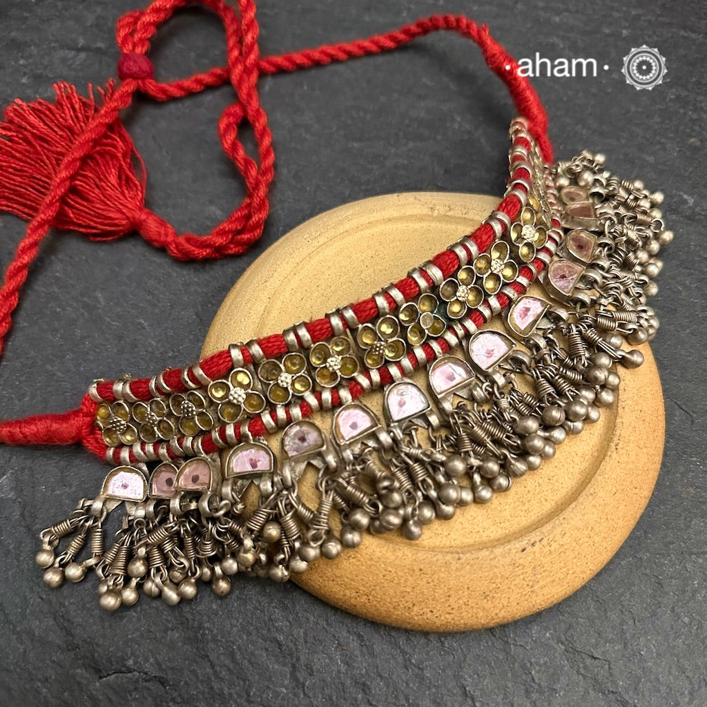 Handcrafted tribal Katesari silver choker from the state of Uttar Pradesh.
As it is a valuable ornament the Katesari choker was worn by the women mainly on festive occasions and marriage ceremonies. Each lower unit of the Katesari choker contain a foil-backed clear-glass 