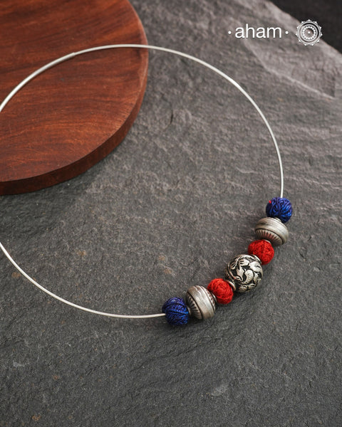 Everyday Wear Silver Pendant in 92.5 silver in Wire Hasli and three beautiful silver balls interspersed with bright cotton balls. Easy to wear, looks great with Indian and Western outfits. The Hasli is easily removable and can be used with any other pendant as well.