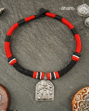 Discover the charm of traditional craftsmanship with our Handmade Karni Devi Mata 92.5 Sterling Silver Pendant on a beautiful cotton cord.&nbsp;
Expertly crafted using the thapi (stamp die) technique, this pendant reflects the age-old artistry of India’s tribal communities. Known by various names like Kavach, Mandaliya, Patri, and Kathla, amulet pendants have long been cherished as symbols of passive worship—a way to keep your deity, Kuldevta, or Kuldevi close to your heart. 