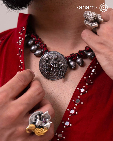Tribal Borla Silver Neckpiece with adjustable thread.
The Rajasthani Borla/Mangtika along with beautiful trinket silver beads has been given a new twist by threading them into a beautiful unique short neckpiece. A perfect, unique piece to wear with your ethnic wear.