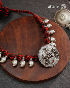 Tribal Borla Silver Neckpiece with adjustable thread.
The Rajasthani Borla/Mangtika along with beautiful trinket silver beads has been given a new twist by threading them into a beautiful unique short neckpiece. A perfect, unique piece to wear with your ethnic wear.