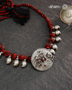 Tribal Borla Silver Neckpiece with adjustable thread.
The Rajasthani Borla/Mangtika along with beautiful trinket silver beads has been given a new twist by threading them into a beautiful unique short neckpiece. A perfect, unique piece to wear with your ethnic wear.