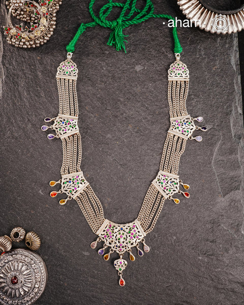 Experience the cultural elegance with our Vintage Tribal Silver Neckpiece. Adorned with intricate chilai work, it boasts a stunning vintage design. Made for those who appreciate traditional craftsmanship, this neckpiece adds a touch of sophisticated charm to any outfit. Embrace the heritage and elevate your style.