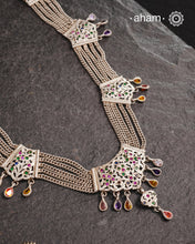 Experience the cultural elegance with our Vintage Tribal Silver Neckpiece. Adorned with intricate chilai work, it boasts a stunning vintage design. Made for those who appreciate traditional craftsmanship, this neckpiece adds a touch of sophisticated charm to any outfit. Embrace the heritage and elevate your style.