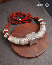 Handcrafted tribal silver Hasli with adjustable cotton thread.Crafted by skilled artisans from Kutch
