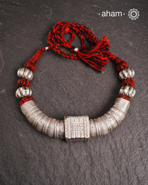 Handcrafted tribal silver Hasli with adjustable cotton thread.Crafted by skilled artisans from Kutch