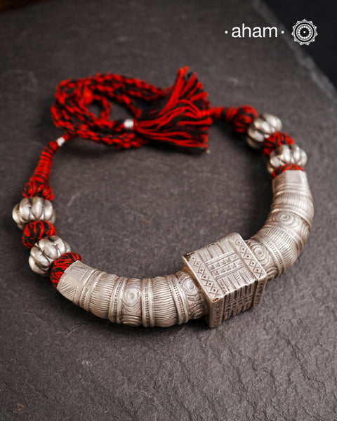 Handcrafted tribal silver Hasli with adjustable cotton thread.Crafted by skilled artisans from kutch