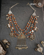 This Tribal Coral Silver Neckpiece draws inspiration from the rich heritage of Yemen’s traditional jewelry. Expertly crafted in silver, it combines vintage elements with carefully selected coral beads to create a unique, timeless piece. The blend of old and new beads offers a distinctive aesthetic that honours cultural artistry while providing a refined accessory for contemporary wear.