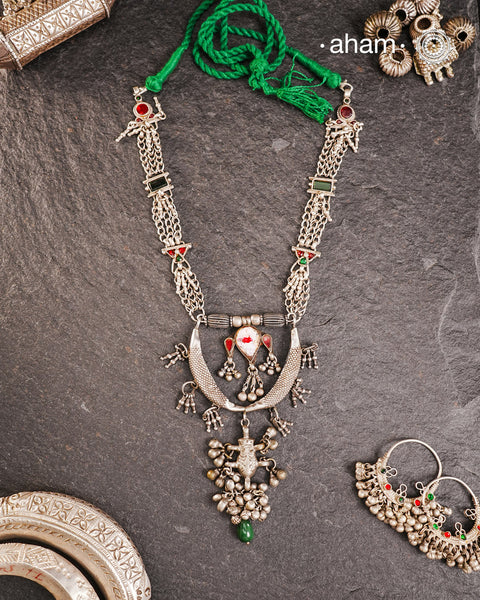 Tribal silver neckpiece handcrafted by threading together multiple tribal . This necklace truly exemplifies the continuity of the traditional prototypes.