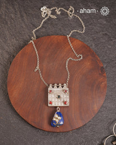 Long silver neckpiece made by putting together some unique vintage tribal silver pieces. Looks great when paired with workwear kurtas, saris or even a shirt.