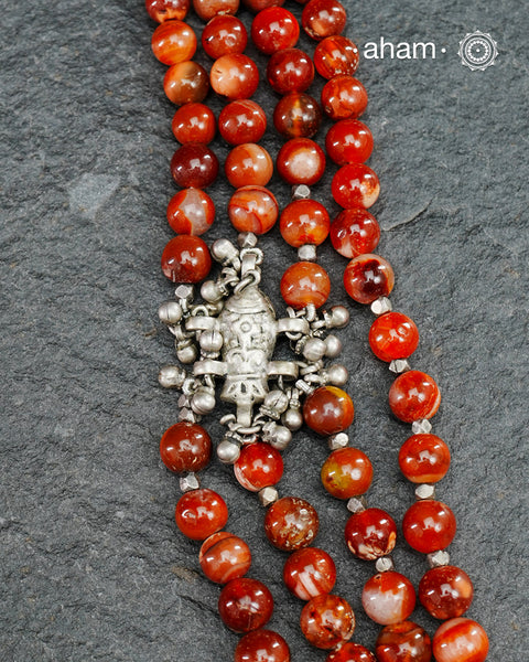 This stunning Ira Silver Neckpiece boasts gorgeous Orange stones and is meticulously crafted from 92.5 sterling silver. Perfect to make a statement, it pairs seamlessly with both traditional and western attire.