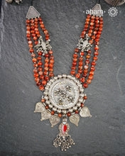 This stunning Ira Silver Neckpiece boasts gorgeous Orange stones and is meticulously crafted from 92.5 sterling silver. Perfect to make a statement, it pairs seamlessly with both traditional and western attire.