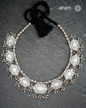 A beautiful Vintage neckpiece with nines geometric units with floral patterns interspersed with Melon shaped beads. We see a reference of this neckpiece in the book Traditional Jewellery of India by Opi Untracht.