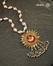 Beautiful handcrafted tribal silver glass pendant from a bygone area, that bring back memories and stories of that time. Threaded on a classic Dholki Chain.