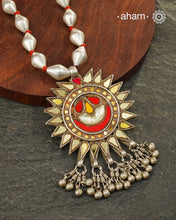 Beautiful handcrafted tribal silver glass pendant from a bygone area, that bring back memories and stories of that time. Threaded on a classic Dholki Chain.