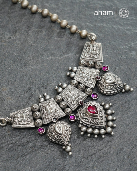 Beautiful 92.5 Sterling Silver handcrafted neckpiece with yali motifs and kemp stone highlights. Crafted by experts in kolhapur.