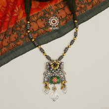 Flaunt this beautiful two tone Ira neckpiece with floral kundan work on green semi precious stone. Beautiful, handcrafted 92.5 sterling silver necklace with semi precious beads. Looks great with both ethnic and western outfits.