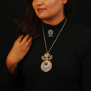 Two Tone Silver Neckpiece is crafted with 92.5% silver and adorned with semi precious stone, peacock motif and kundan highlights making it a perfect piece of jewellery for any special occasion.