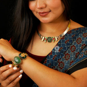 This Noori Two Tone Silver Hasli stands out from the crowd with a unique dual tone design and kundan work. The versatile accessory can be worn to complement any outfit - from formal suits to traditional Indian ethnic wear. When looking for a stylish yet practical accessory, this is the one you want.