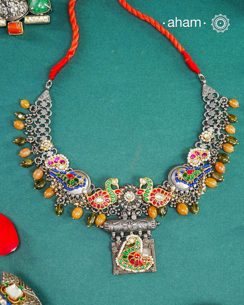 One of a kind statement wearable art pieces. An eclectic mix of elements, with a play of colours, textures, forms and workmanship. Crafted in Silver with two tones that makes this neckpiece so versatile and unique. Modern Heirloom pieces that can be worn across generations. 