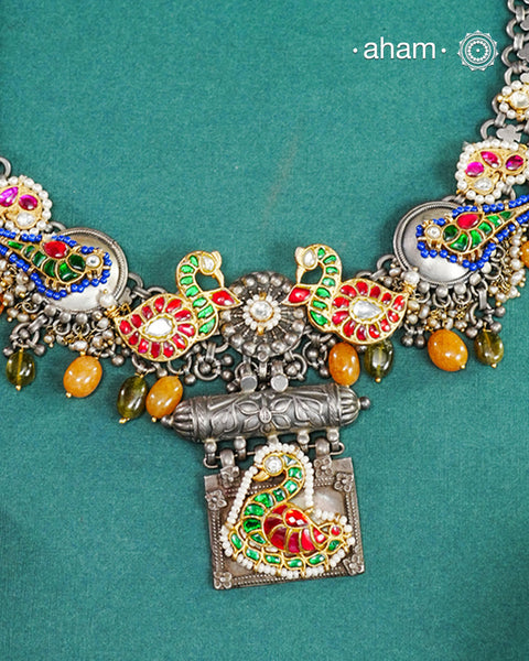 One of a kind statement wearable art pieces. An eclectic mix of elements, with a play of colours, textures, forms and workmanship. Crafted in Silver with two tones that makes this neckpiece so versatile and unique. Modern Heirloom pieces that can be worn across generations. 