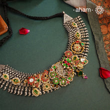 One of a kind statement wearable art pieces. An eclectic mix of elements, with a play of colours, textures, forms and workmanship. Crafted in silver with two tones that makes this neckpiece so versatile and unique. Comes with Intricately detailed pices and kundan highlights, all crafted in 92.5 silver. A modern Heirloom piece that can be worn across generations.