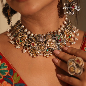 One of a kind statement wearable art pieces.&nbsp;An eclectic mix of elements, with a play of colours, textures, forms and workmanship. Crafted in Silver with two tones that makes this neckpiece so versatile and unique. Modern Heirloom pieces that can be worn across generations.