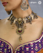 One of a kind statement wearable art pieces.&nbsp;An eclectic mix of elements, with a play of colours, textures, forms and workmanship. Crafted in Silver with two tones that makes this neckpiece so versatile and unique. The design seamlessly blends vintage pieces with new kundan pieces. All crafted in silver. Modern Heirloom pieces that can be worn across generations.
