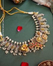 One of a kind statement wearable art pieces. An eclectic mix of elements, with a play of colours, textures, forms and workmanship. Crafted in Silver with two tones and kundan highlights and beautiful cultured pearls that makes this neckpiece so versatile and unique. Modern Heirloom pieces that can be worn across generations.