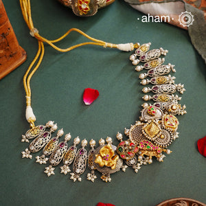 One of a kind statement wearable art pieces. An eclectic mix of elements, with a play of colours, textures, forms and workmanship. Crafted in Silver with two tones and kundan highlights and beautiful cultured pearls that makes this neckpiece so versatile and unique. Modern Heirloom pieces that can be worn across generations.