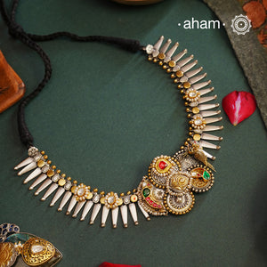 One of a kind statement wearable art pieces. An eclectic mix of elements, with a play of colours, textures, forms and workmanship. Crafted in 92.5 Silver with two tones and bird motif kundan highlights makes this neckpiece so versatile and unique.&nbsp; Modern Heirloom pieces that can be worn across generations