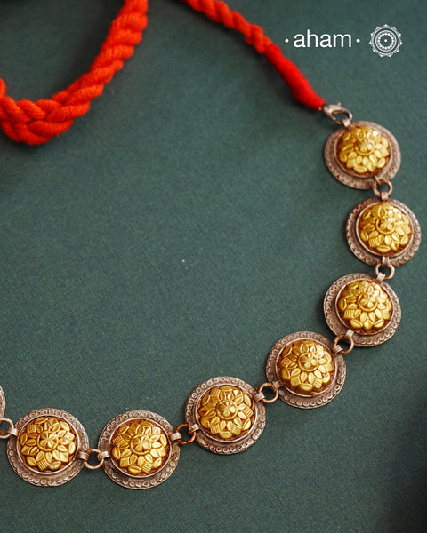 Enhance your style with the timeless elegance of the Dual Tone Silver Choker which can also be worn lower around the neck. Handcrafted by skilled karigars in Barmer, Rajasthan, this neckpiece features traditional Bandhel work, where a thin sheet of hand beaten 22 carat gold is set on 92.5 silver using a unique wax setting technique. A classic representation of fine Indian traditional craftsmanship.&nbsp;
