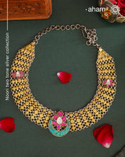 Expertly crafted with 92.5 silver, the Noori Two Tone Silver Neckpiece exudes elegance with its dual tone design. The striking pink and turquoise kundan lotus highlights add a touch of glamour to this stunning piece. Elevate any outfit with this exquisite neckpiece. Perfect for intimate family gatherings and festivities.