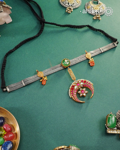 Crafted with precision and elegance, our Noori Two Tone Silver Neckpiece showcases n a dual tone of silver and gold. Made from 92.5 silver, this exquisite piece exudes sophistication and timeless beauty. Elevate your look with this stunning neckpiece.